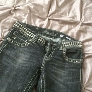 Black skinny Miss Me Jeans. Studded waist band.